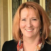 Profile Image for Julie Dini.